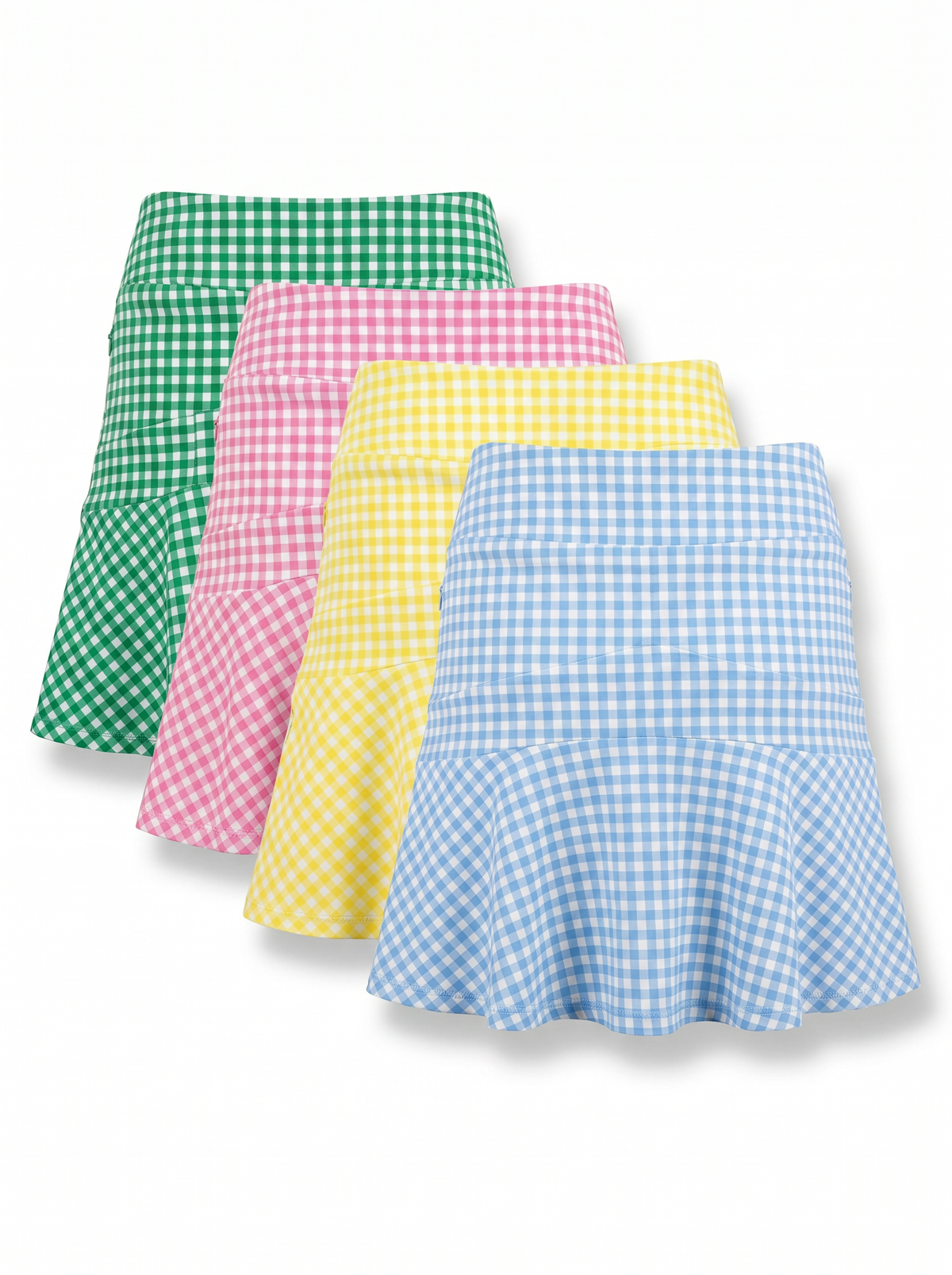 Four gingham mini skirts in green, pink, yellow, and light blue, arranged in a diagonal stack on a white background.