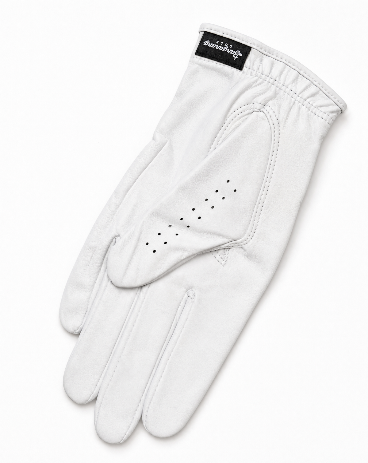 White golf glove with a brand label on a white background