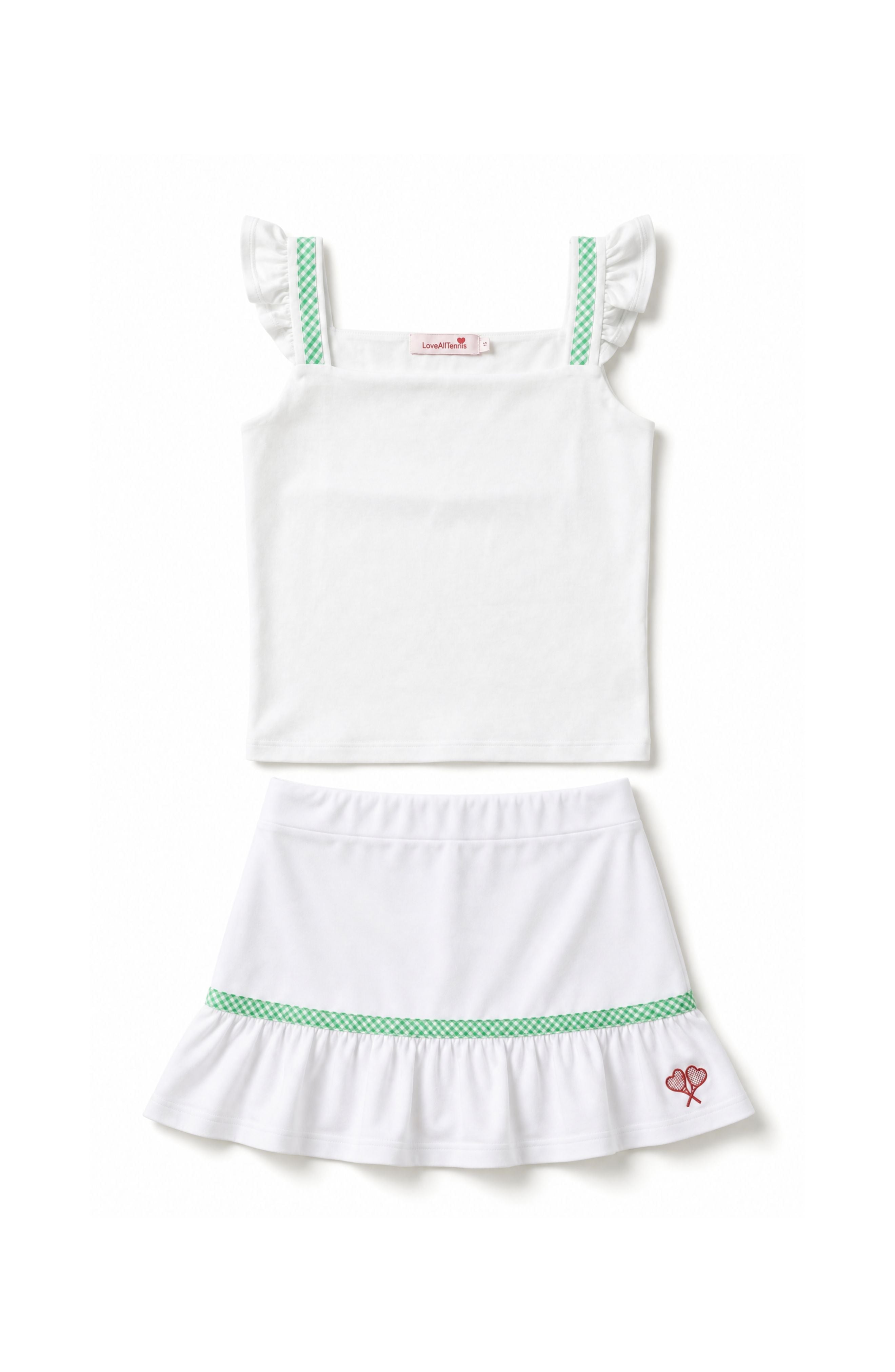 White dress with green trim on a white background