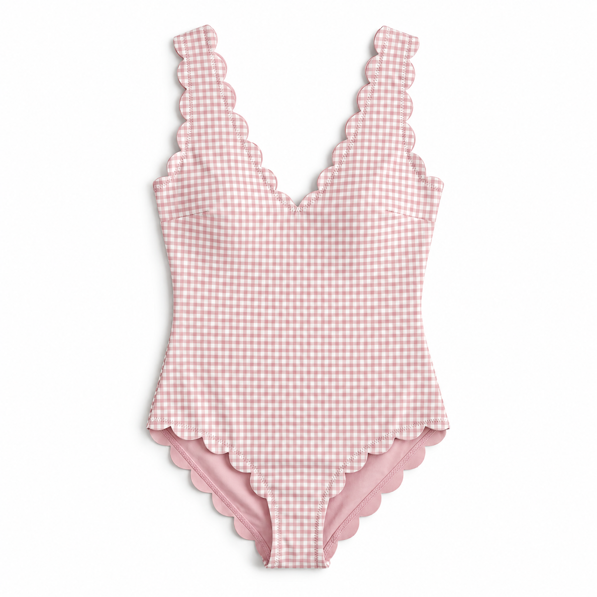 A pink and white gingham one-piece swimsuit with scalloped shoulder straps and a scalloped leg opening, shown flat against a white background.