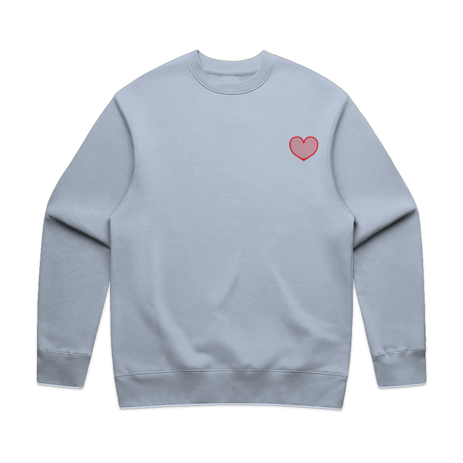 Light blue sweatshirt with a red heart on a white background