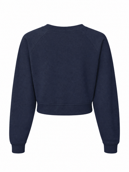 A navy blue cropped crewneck sweatshirt with raglan sleeves, shown from the back on a plain white background.
