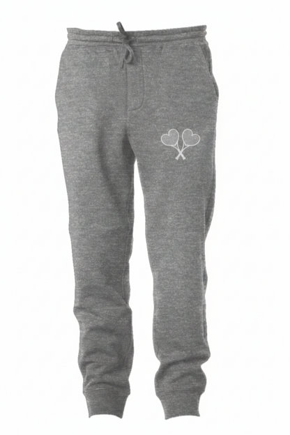 Gray sweatpants with a heart and tennis racket design on a white background