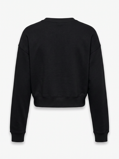 A black cropped crewneck sweatshirt shown from the back, featuring long sleeves with ribbed cuffs and a ribbed hem, displayed on a clean white background.