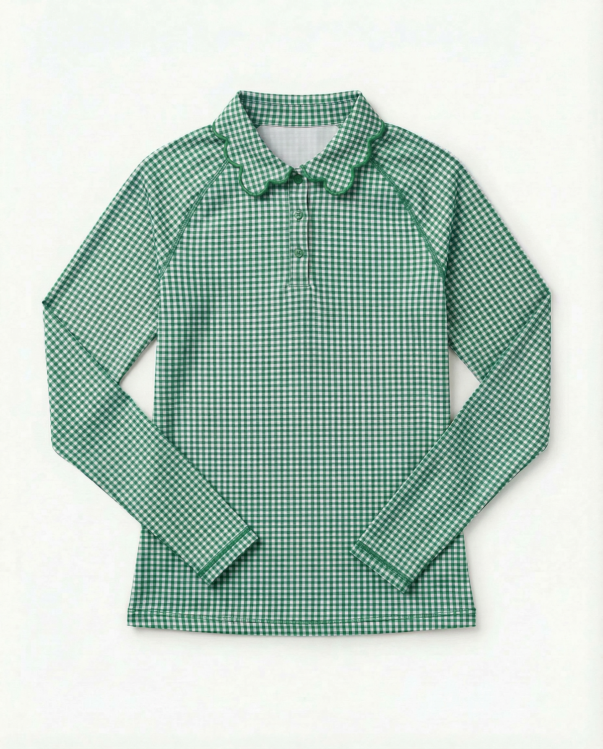 A green and white gingham long-sleeve polo shirt with a buttoned collar, laid flat against a white background.