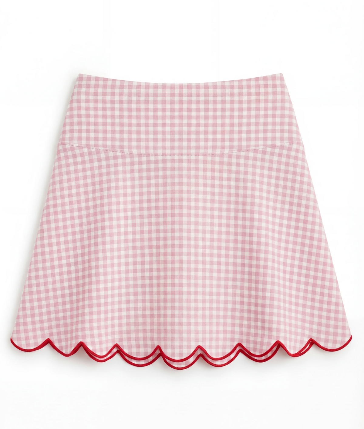 Pink gingham skirt with scalloped edge on a white background