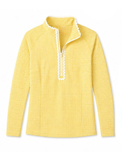 A yellow and white gingham long-sleeve top with a mock neck and white lace trim down the front placket, shown on a plain white background.