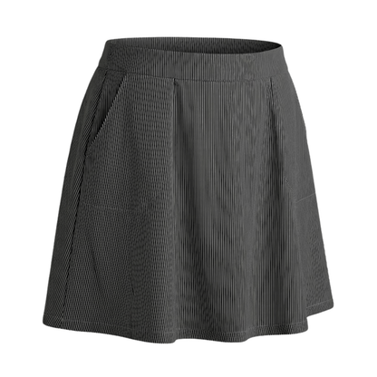 Navy striped golf skirt set against a flat white background