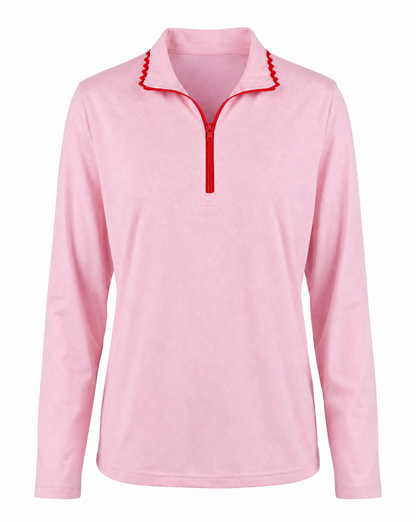 A light pink long-sleeve quarter-zip pullover with a red zipper and red zigzag trim along the collar, shown on a plain white background.
