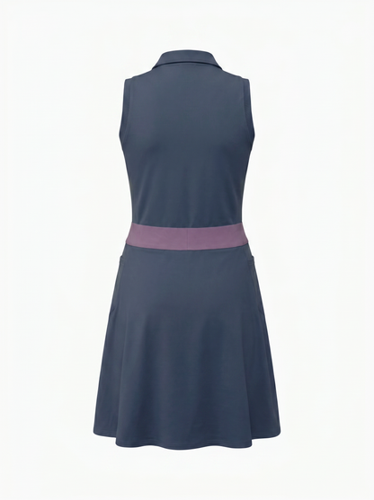 A sleeveless collared dress shown from the back, featuring a slate blue body with a contrasting dusty purple waistband, set against a plain white background.