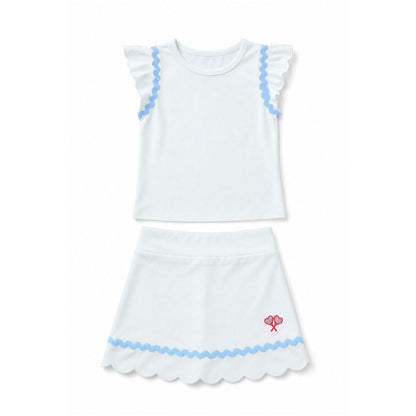 White top and skort with blue trim and a red heart design on a white background