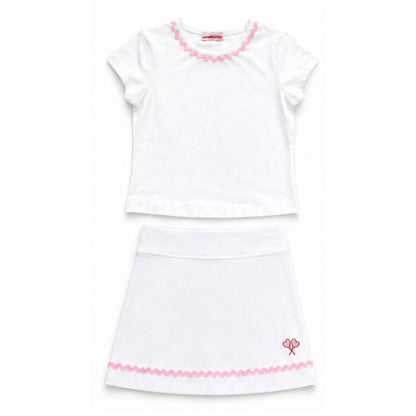 White dress with pink trim on a white background