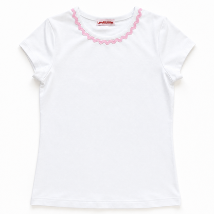 White t-shirt with pink trim on a white background