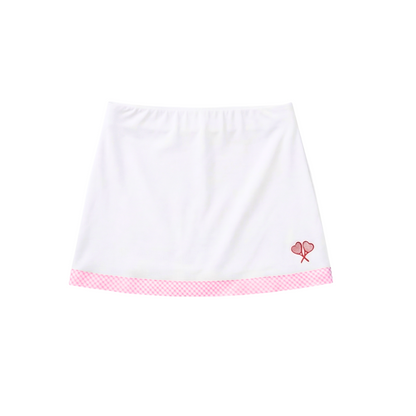 White skirt with pink trim and heart design on a white background