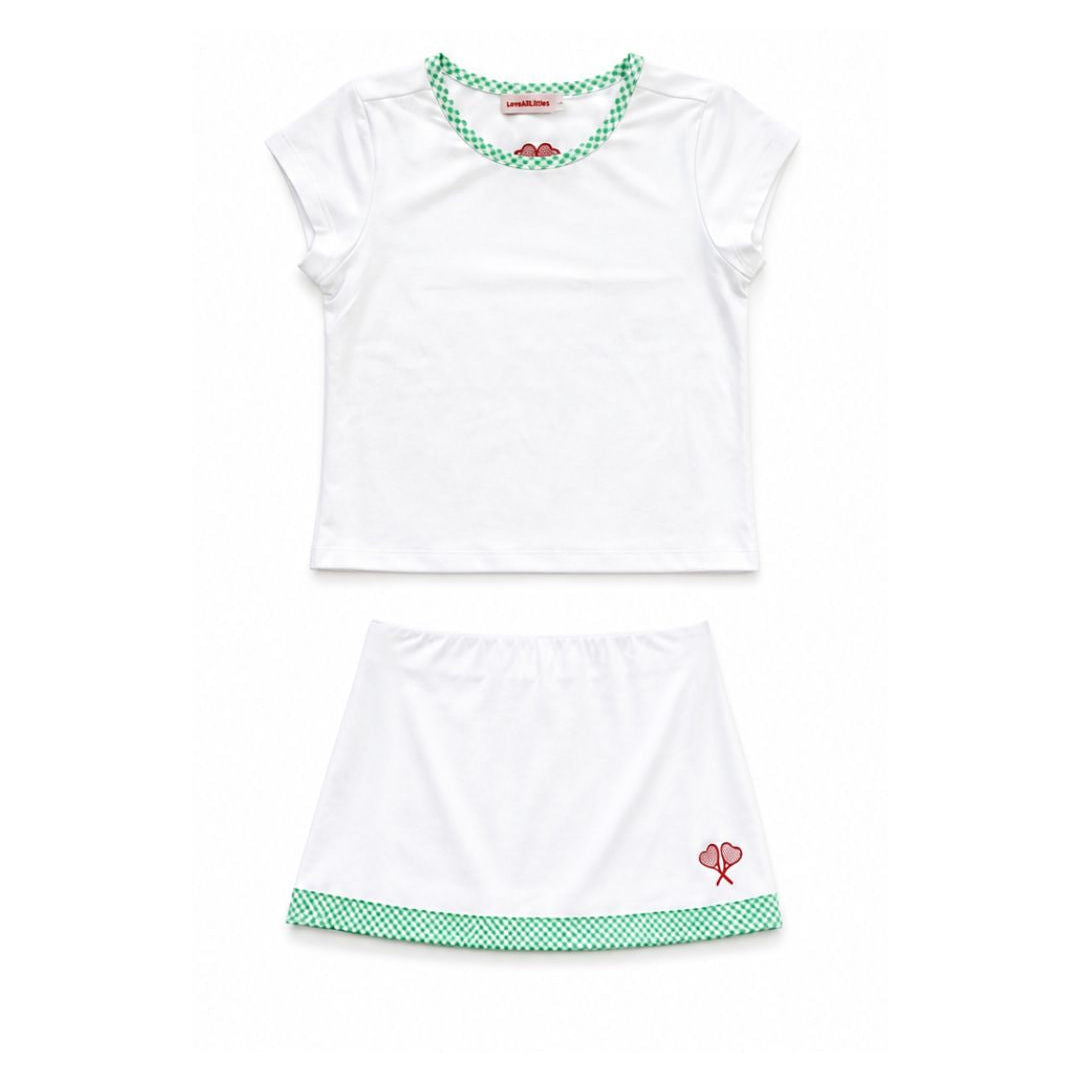 White tennis outfit with green accents on a white background