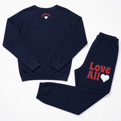 A two-piece navy blue sweatshirt and jogger pants set with 'Love All' printed in red and a white heart on the front, shown on a clean white background.