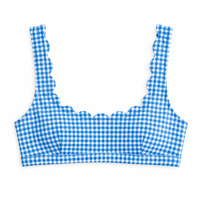 A blue and white gingham check bikini top with scalloped edges, displayed flat against a solid white background.