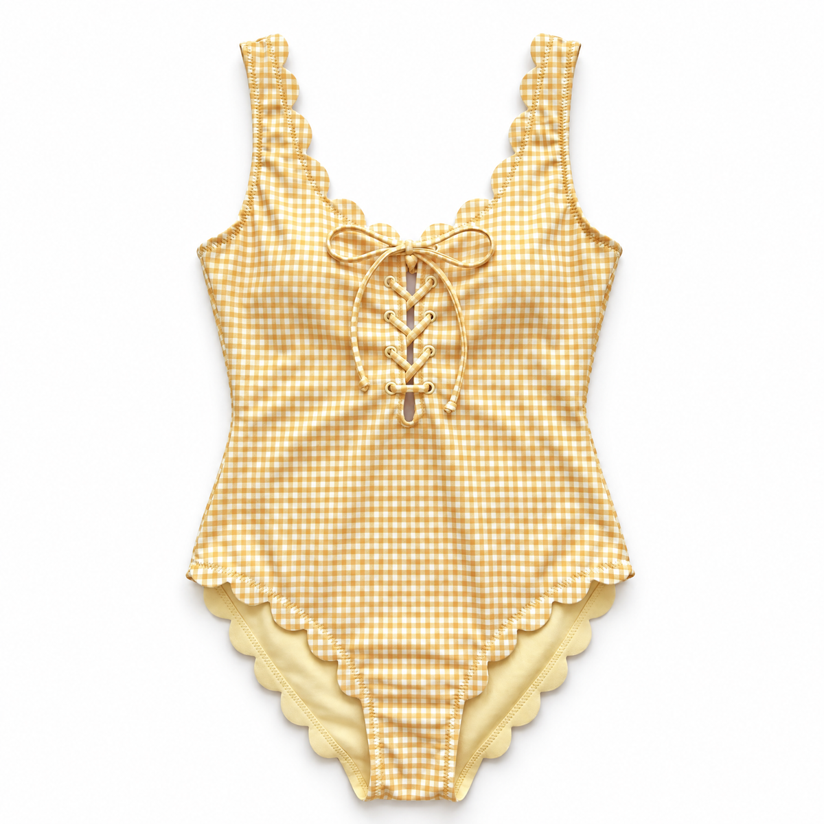 A yellow and white gingham one-piece swimsuit with scalloped edges and a lace-up front, displayed flat against a white background.