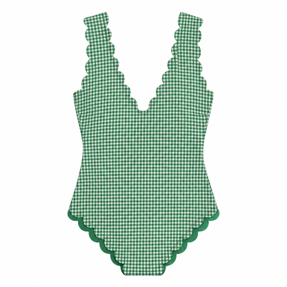 Green and white gingham one-piece swimsuit with ruffled shoulder straps and a scalloped leg opening, shown flat on a white background.