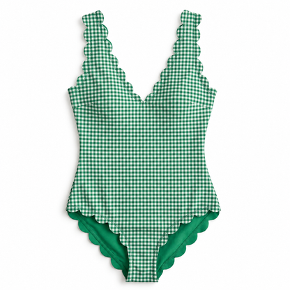 A green and white gingham one-piece swimsuit with scalloped edges, shown flat against a white background.