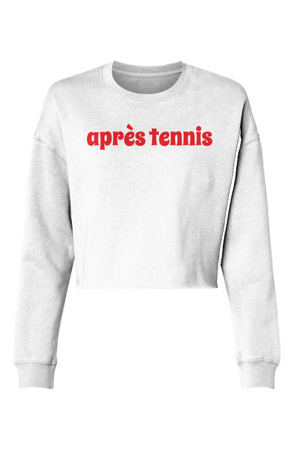 White sweatshirt with red text 'apres tennis' on a white background