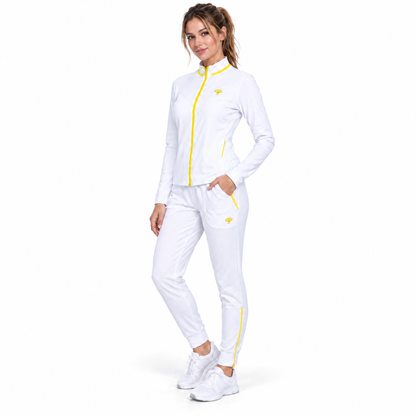 A woman modeling a white athletic tracksuit with bright yellow zipper and stripe accents, featuring a long-sleeve zip-up jacket and matching jogger pants, against a plain white background.
