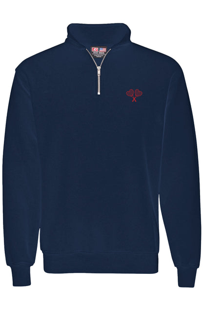Navy blue quarter zip pullover with a small red logo on the chest and a cadet collar.
