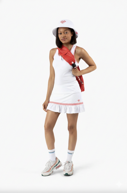 Person wearing a red backpack with a white logo on a white background