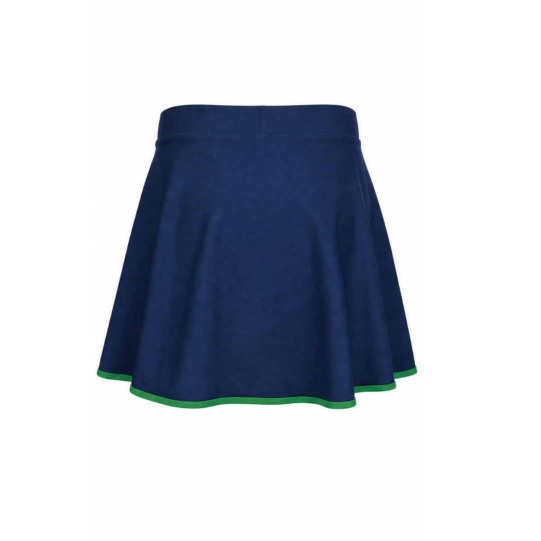 A navy blue flared skort with a thin green trim along the hem, shown against a plain white background.