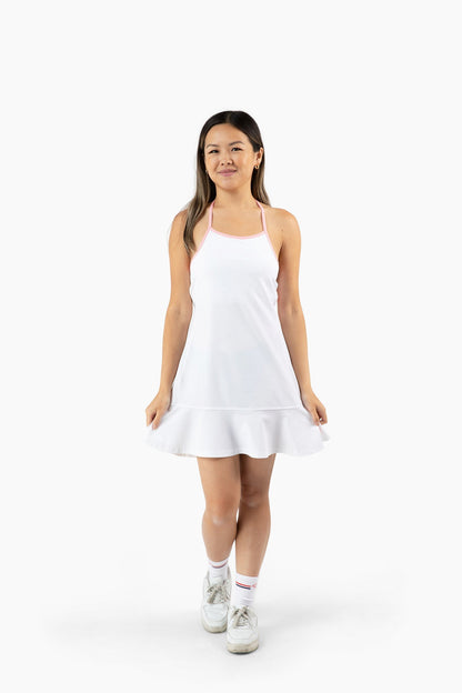 Woman wearing a white dress on a white background