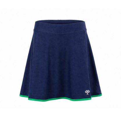 A navy blue athletic skirt with a green trim along the hem and a small white embroidered logo on the lower right side, shown against a plain white background.