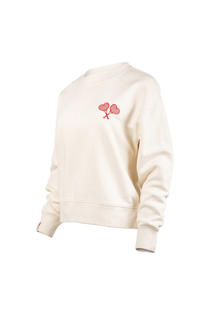 White sweatshirt with red heart design on a white background