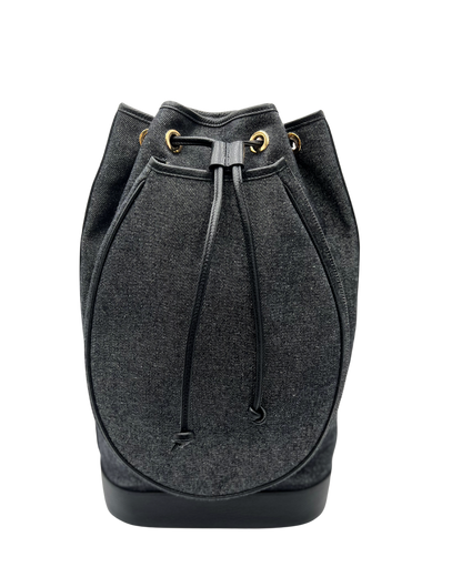 A dark gray textured bucket bag with black drawstrings and gold-tone metal eyelets, shown against a plain white background.