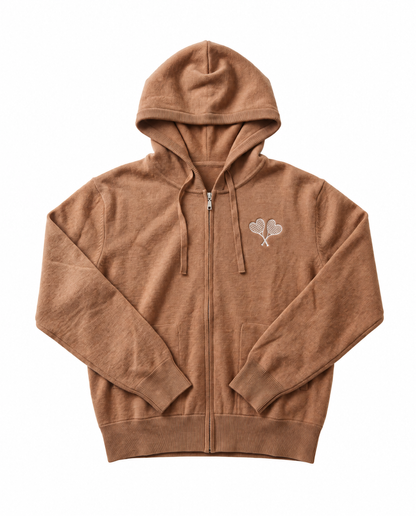 A brown zip-up hoodie with a small white embroidered double-heart design on the left chest, displayed flat against a solid white background.